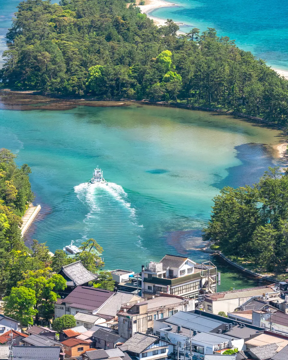 A sightseeing boat in the channel at Amanohashidate