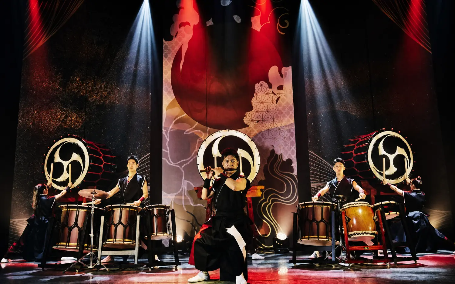 Taiko drummers on stage at DRUM TAO Theater Kyoto