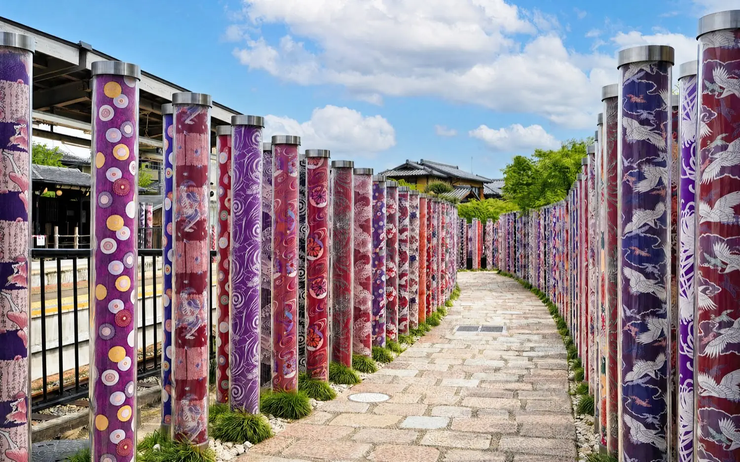 Pillars wrapped in Kyoto-dyed fabric at the Kimono Forest