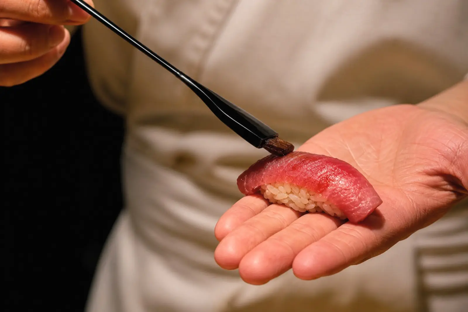Sushi finished by hand