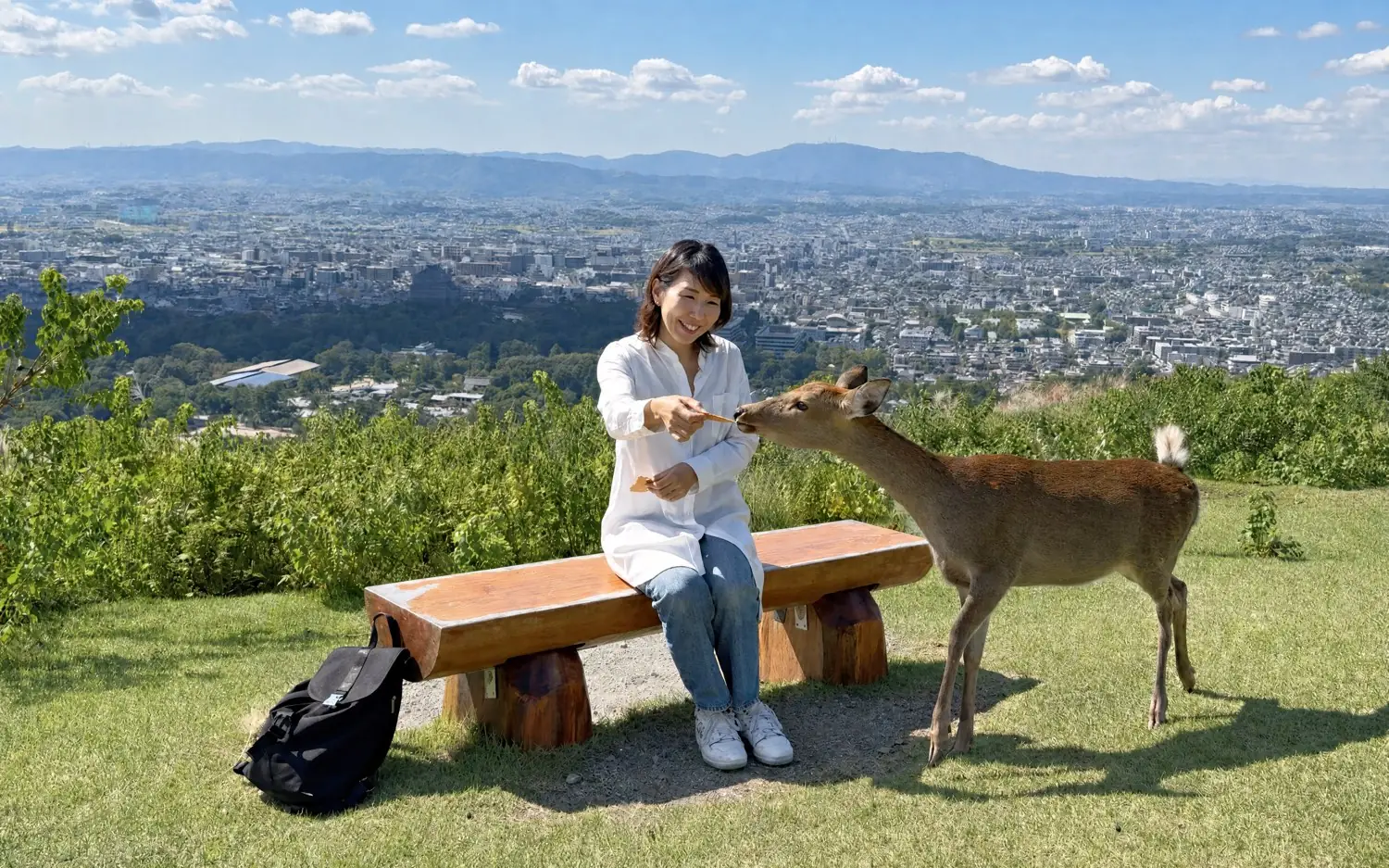 Hiroko feeding deer crackers on Mount Wakakusa