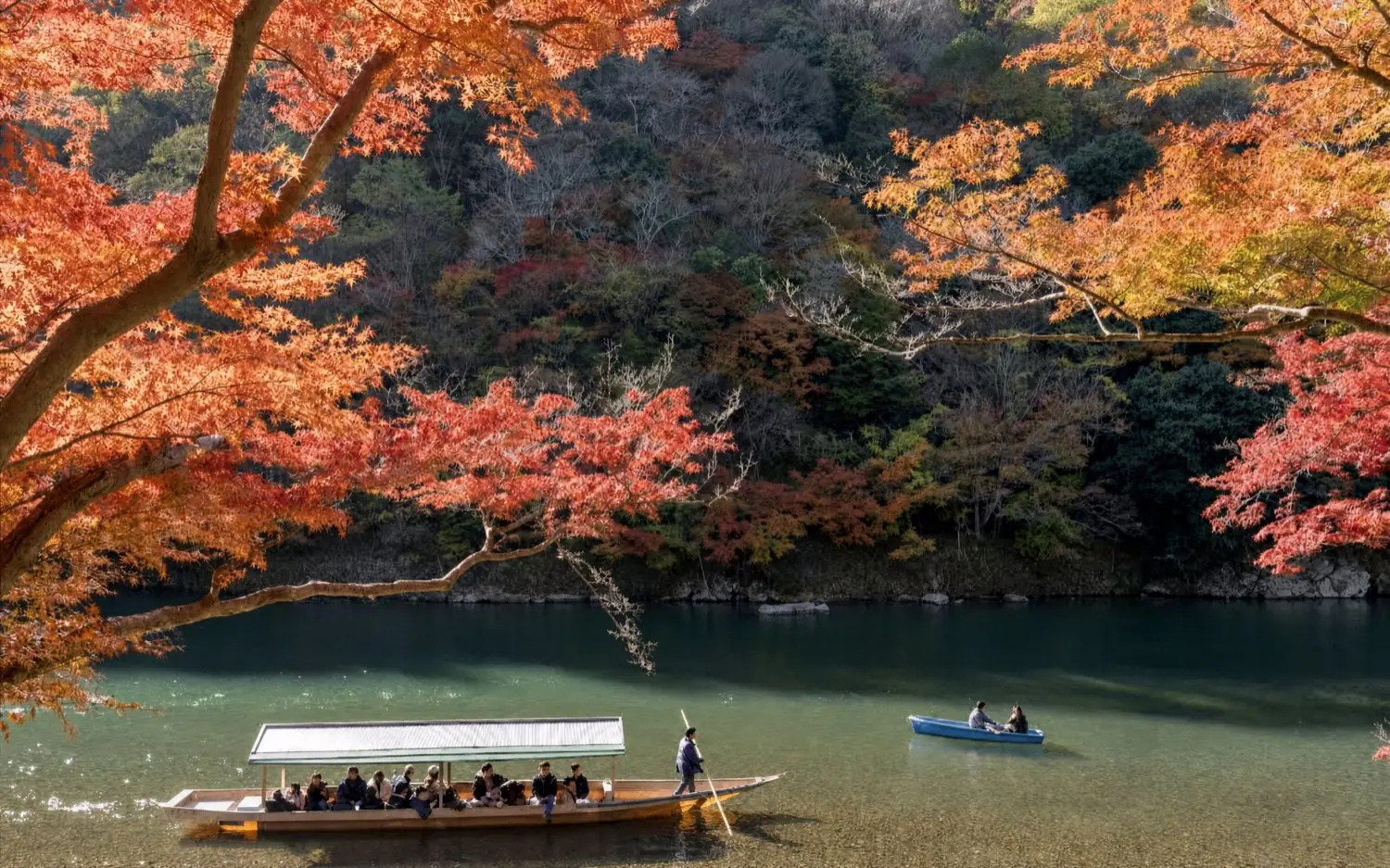 The Hozu river and a pleasure boat seen from Arashiyama Park